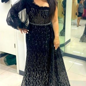 Black and silver one shoulder gown